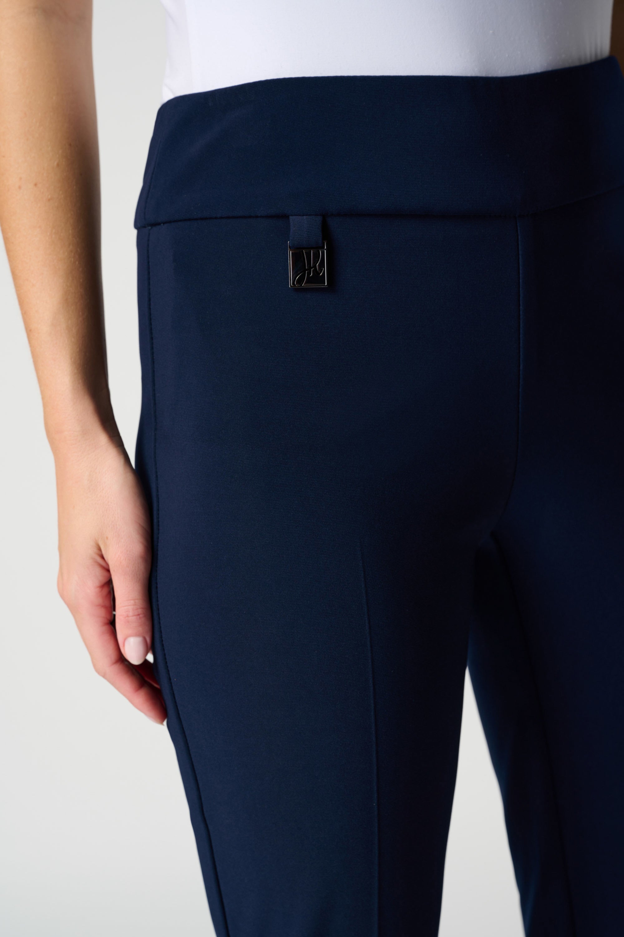 Front detail image of Joseph Ribkoff pull on classic tailored slim pant in midnight navy.