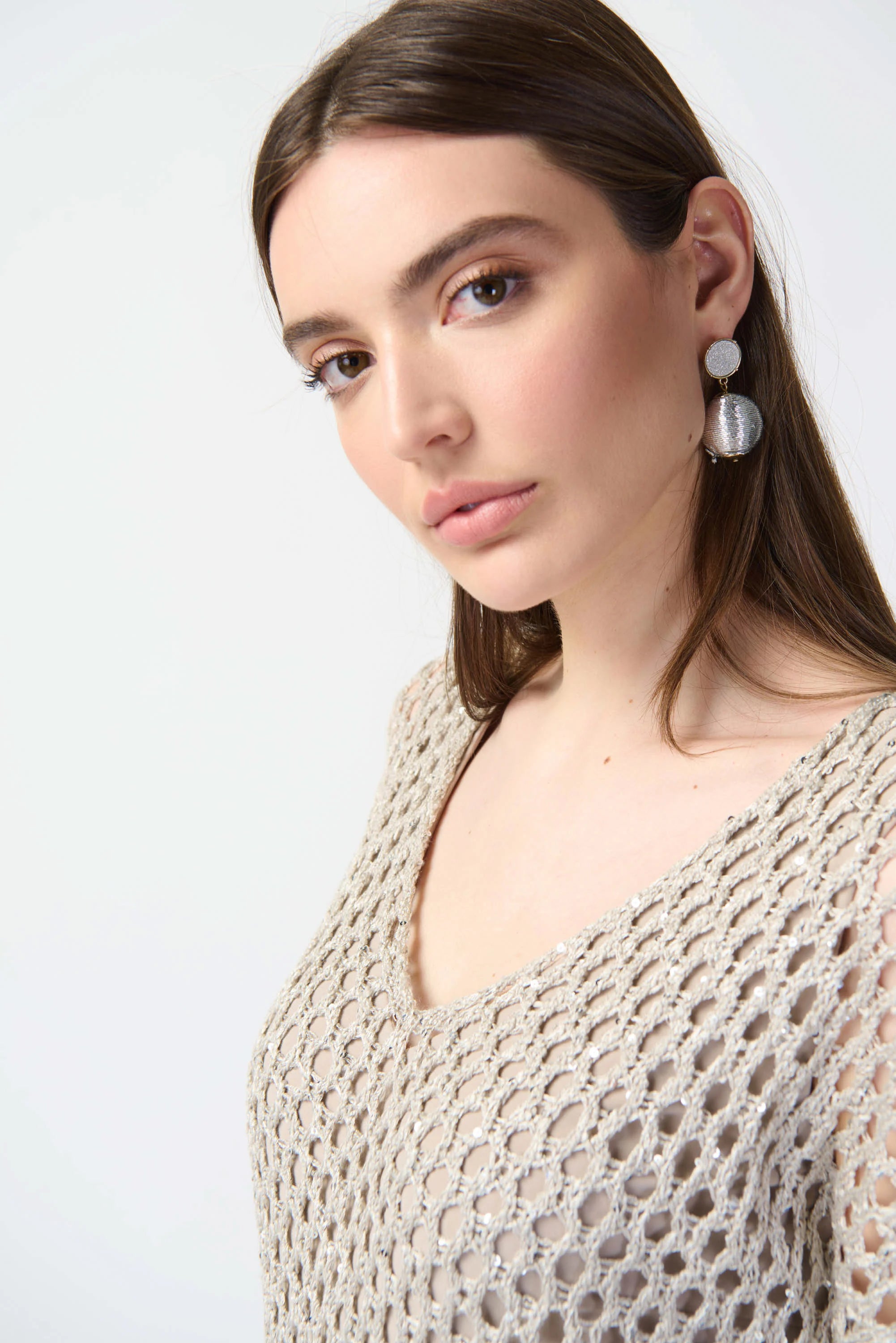 Front image of Joseph Ribkoff open stitch sweater in champagne.