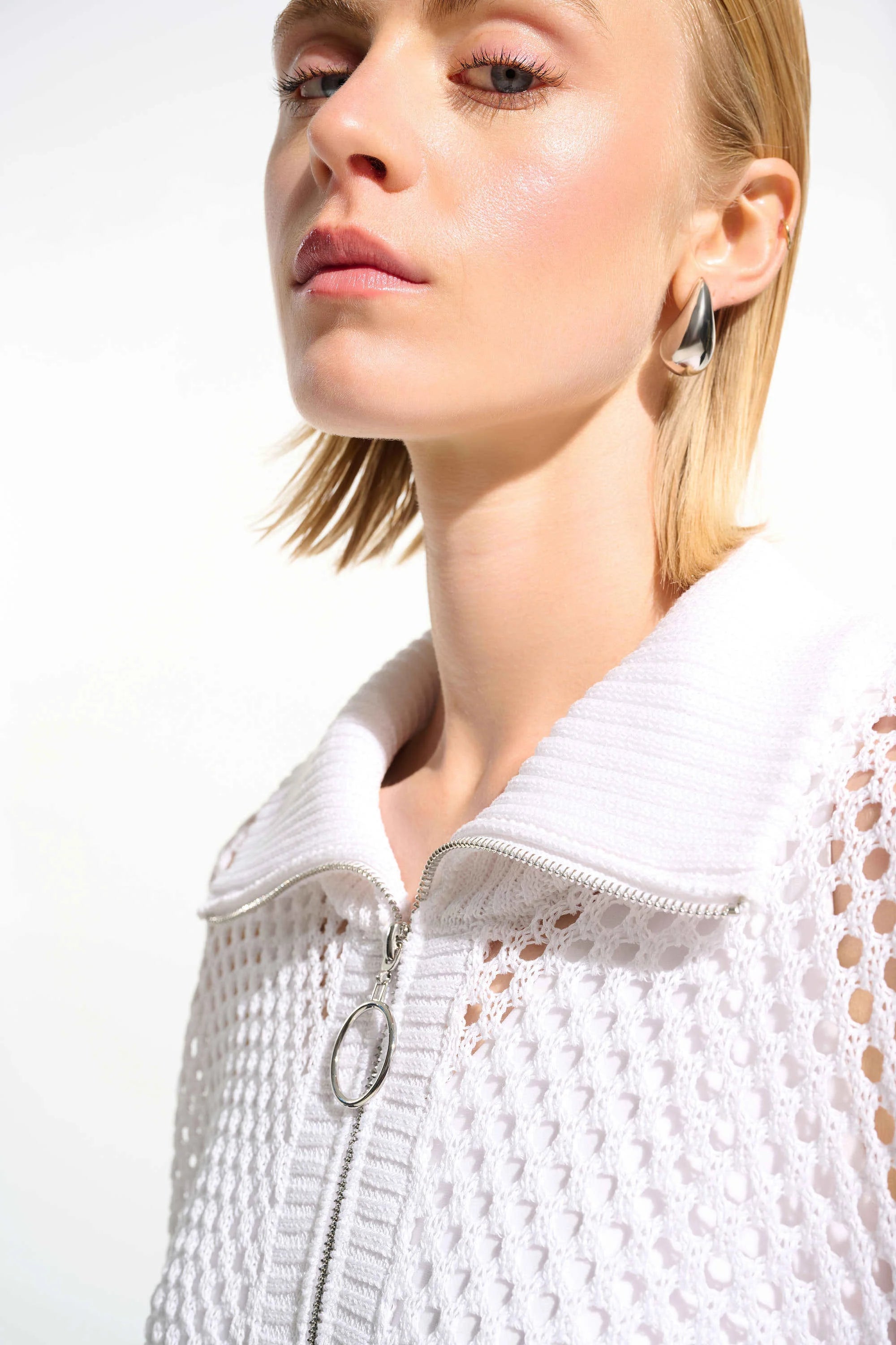 Close up View Image of Joseph Ribkoff Vicsoze Blend Boxy Sweater nit with Zipped Neckline in Vanilla
