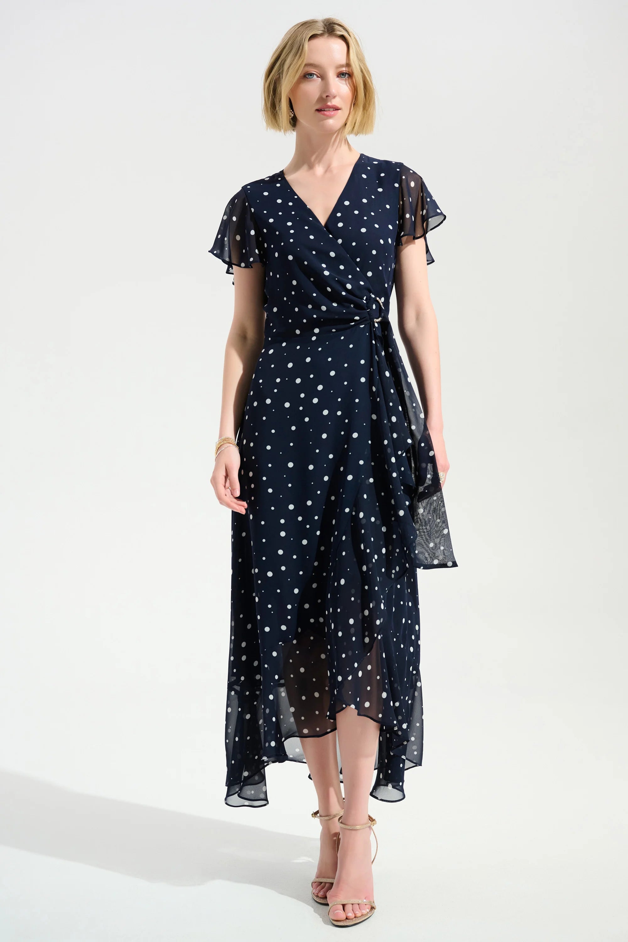 Front View Image of Joseph Ribkoff Chiffon Print Wrap Dress With Ruffle Detail in midnight Blue/Vanilla
