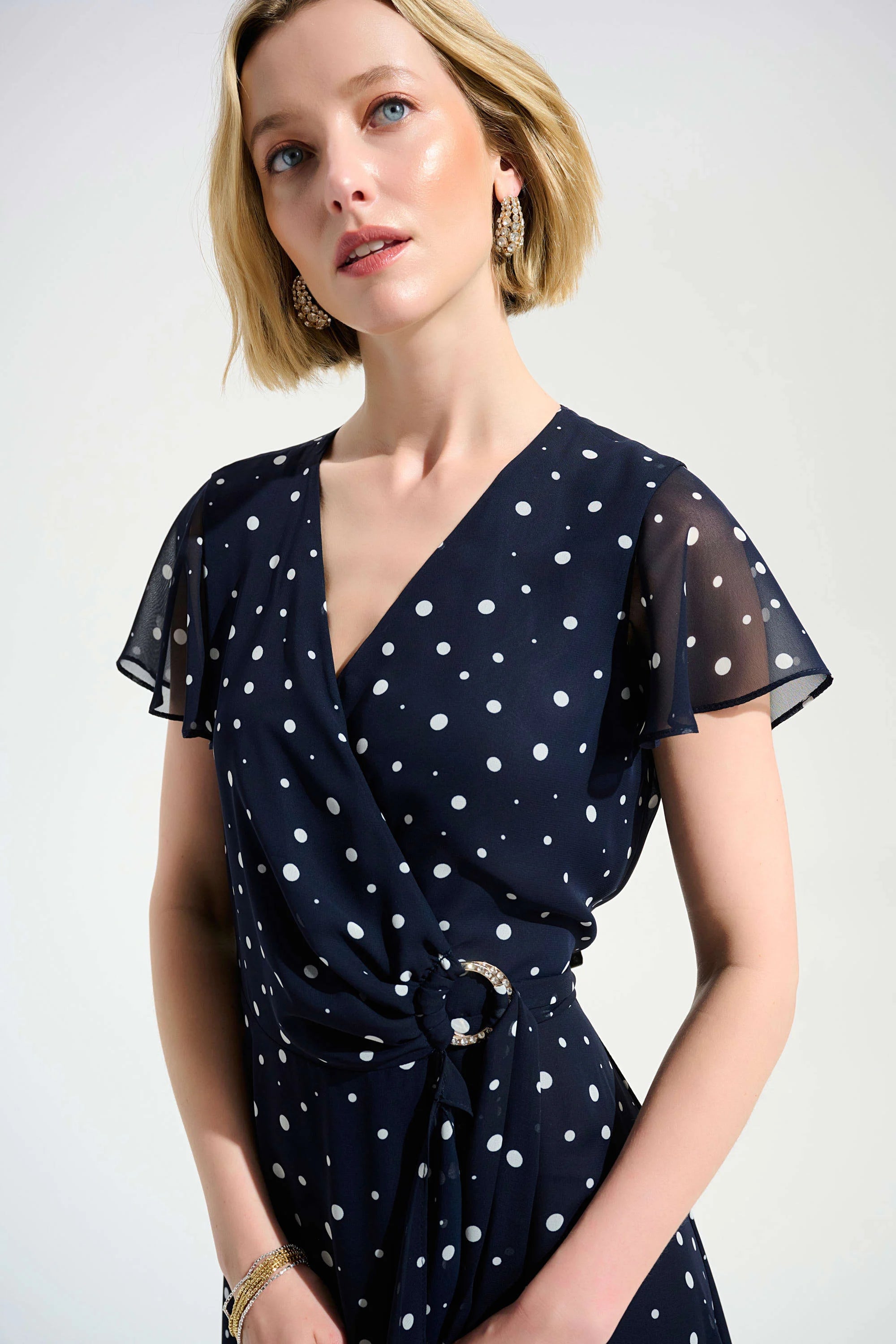 Close Up  View Image of Joseph Ribkoff Chiffon Print Wrap Dress With Ruffle Detail in midnight Blue/Vanilla
