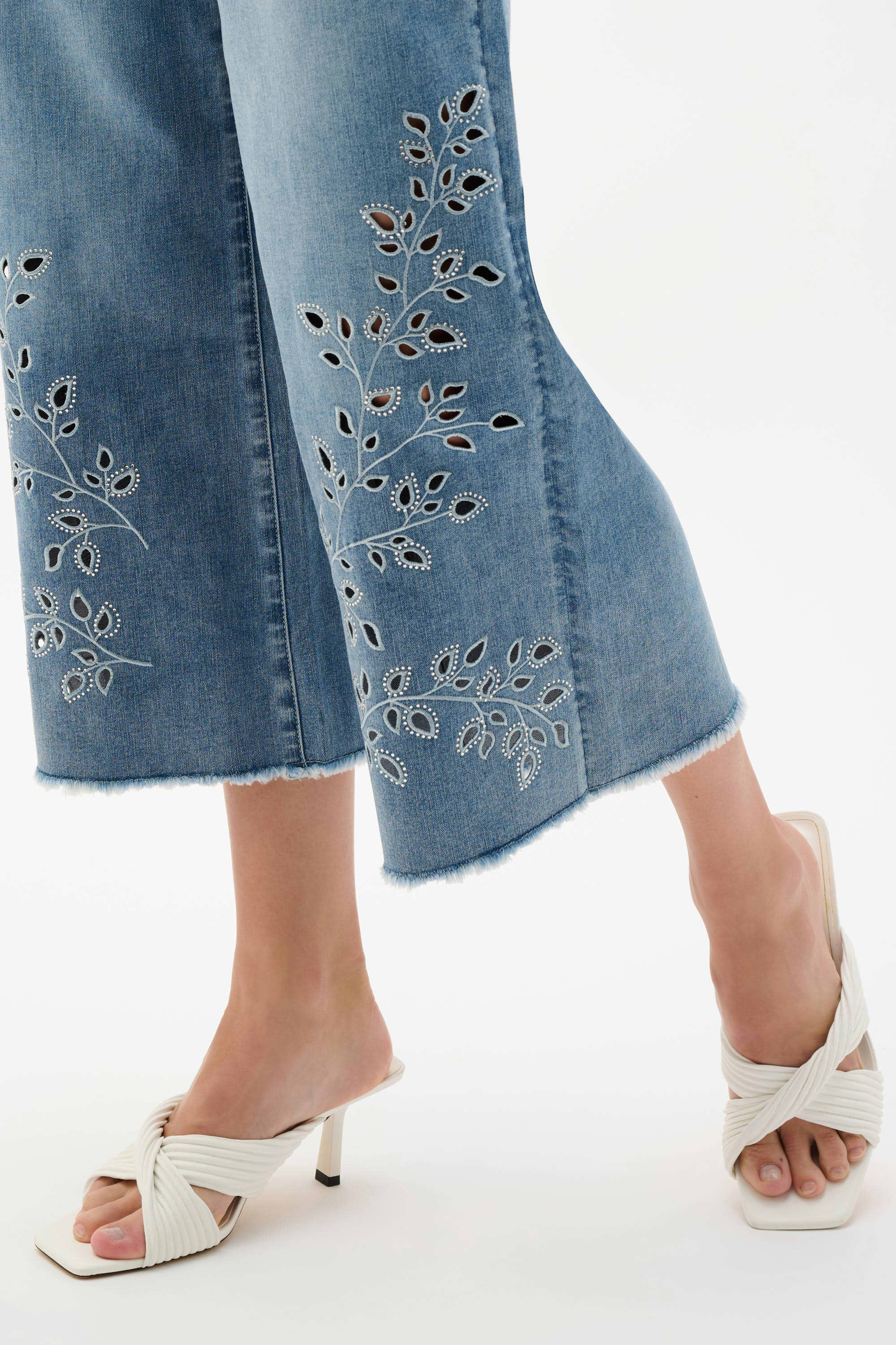 Front Close Up View Image of Joseph Ribkoff Repreve® Denim Wide Leg Crop Jeans With Embroidery in Light Blue Denim