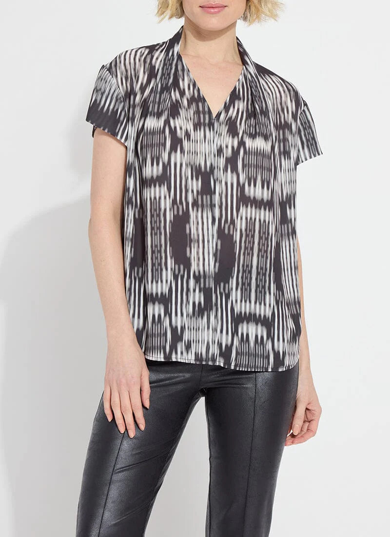 Front image of Lysse Katya Sleeve Top in black print. 