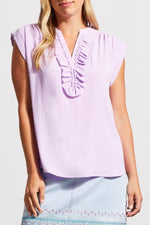 Front image of Tribal cap sleeve airflow top in light purple. 