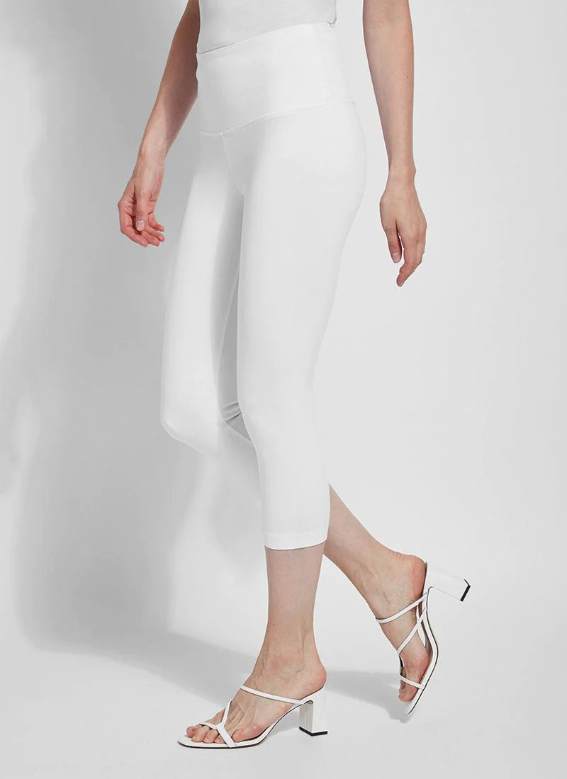 Side image of Lysse pull on denim capri in white. 