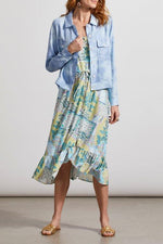 Front image of Tribal high/low button front dress with ruffle. Blue printed cascade print. 