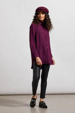 Front image of Tribal roll sleeve air flow tunic. Dark purple button front top. 