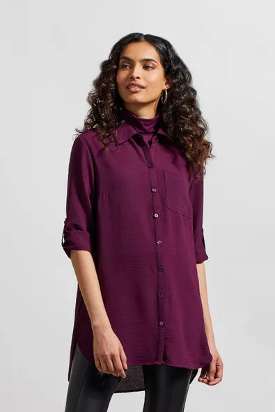 Front image of Tribal roll sleeve air flow tunic. Dark purple button front top. 