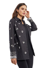 Front image of Adore long sleeve button front pearl trim top. Black blouse with pearl details. 