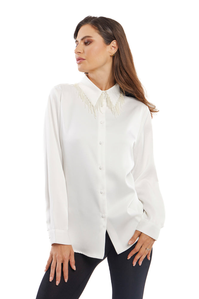 Front image of adore long sleeve button front pearl collar top. White blouse with hanging pearl detail. 