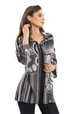 Front image of Adore long sleeve multi button front jacket. Black and grey printed top. 