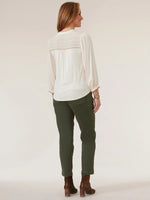 Back image of Democracy 3/4 sleeve blouson embroidered top. French vanilla detailed blouse. 