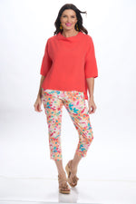 Front image of Suzy D London coral cowl neck top. 