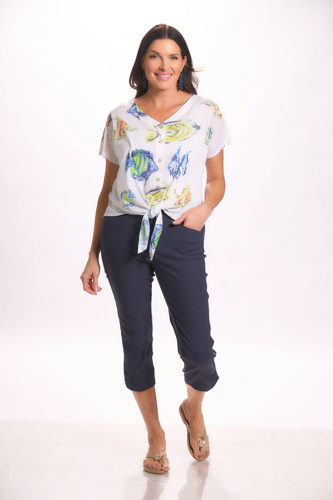 Front image of short sleeve impluse blue fish top. Tie front button front top. 
