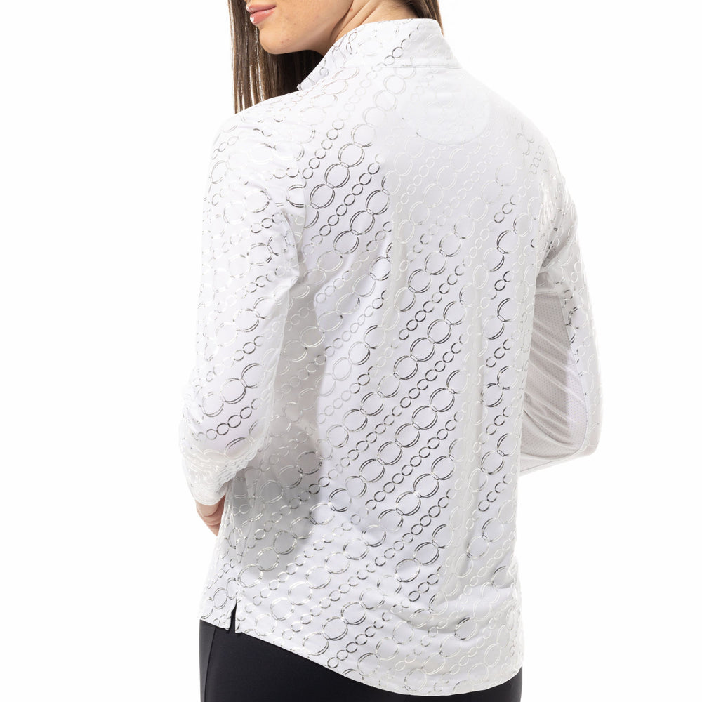 Back image of SanSoleil solshine long sleeve top. White and silver printed top. 