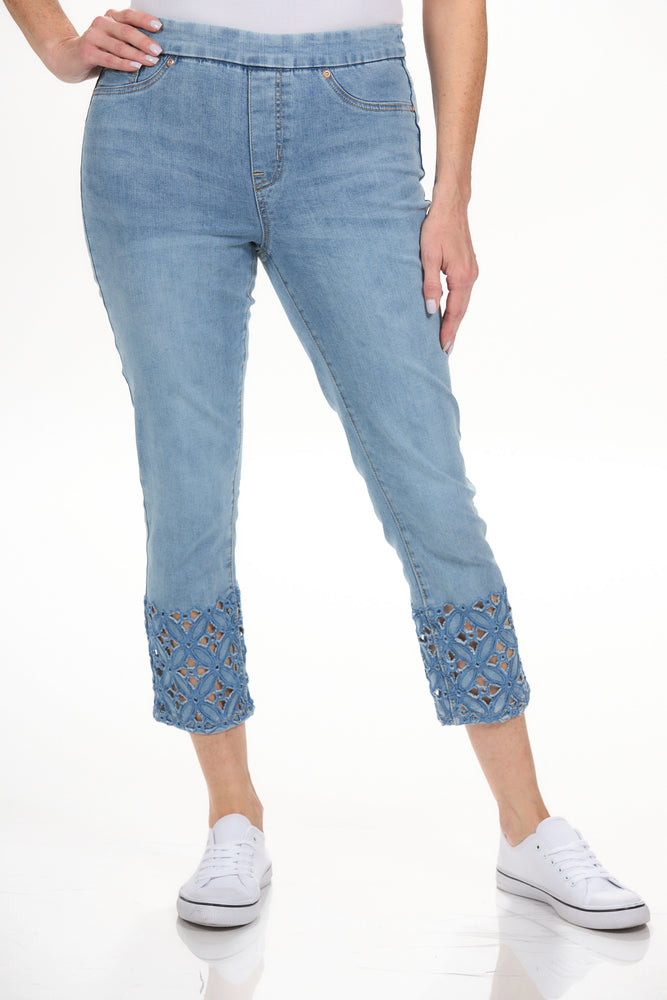Front view pull on crop jean with embroidered and cutout hem