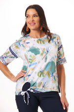 image of short sleeve tie top with leaves pattern