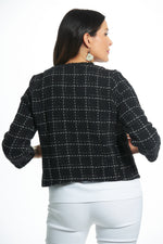 Back view black and white long sleeve boucle jacket