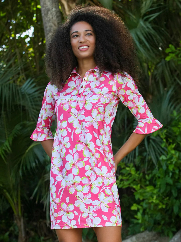 Front image of Anaclare Marin printed polo dress in coral floral. 