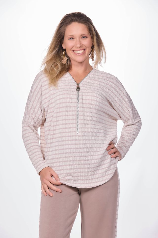 Front image of long sleeve zip front striped sweater.