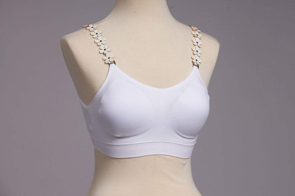 Front image of strap its white vegan flower bra. 