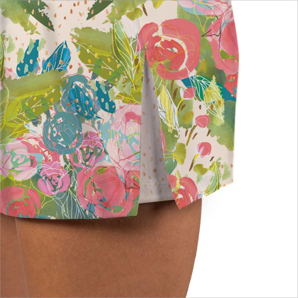 Close up of side slit on rose print skort with pocket