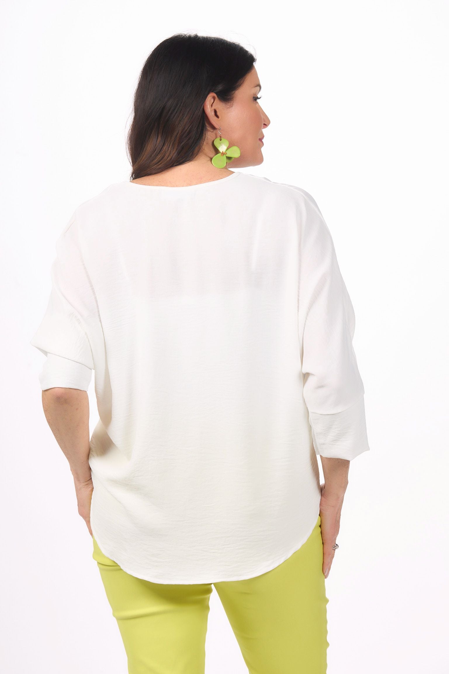 Back image of last tango v-neck dolman sleeve top in white. 