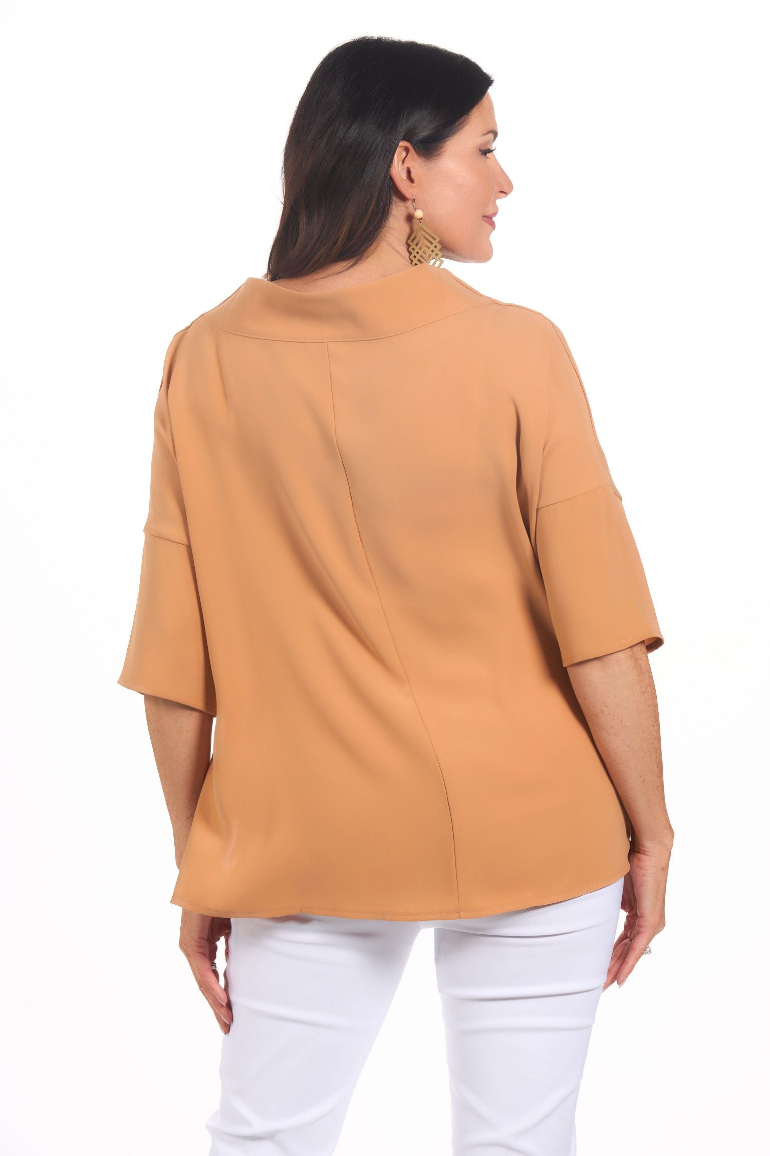 Back image of audrey cowl neck top in camel tan.