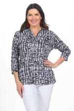 Front image of shana black and white crinkle material top. 