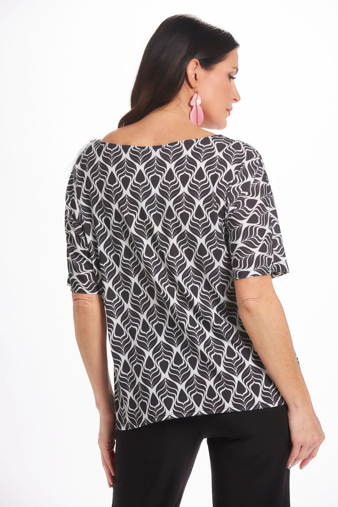 Back image of Mimozza Dolman sleeve relaxed top. Black and white feather printed top. 