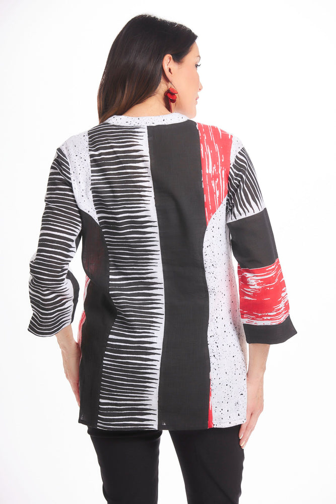 Back image of parsley&sage 3/4 sleeve flare shirt. Black white and red geo printed top. 