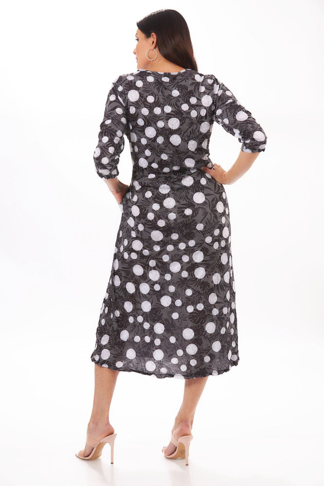 Back image of Shana mix print dress. Black and white crinkle dress. 