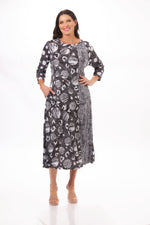 Front image of Shana mix print dress. Black and white crinkle dress. 
