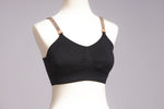 Front image of Strap its bra in black and champagne shimmer.