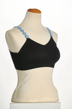 Front image of strap its bra in black with denim flowers. 