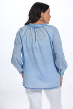 Back image of made in italy long sleeve half button top. 