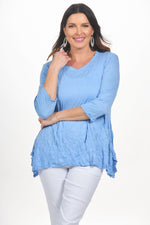 Front image of Shana light blue scoop neck crinkle top. 