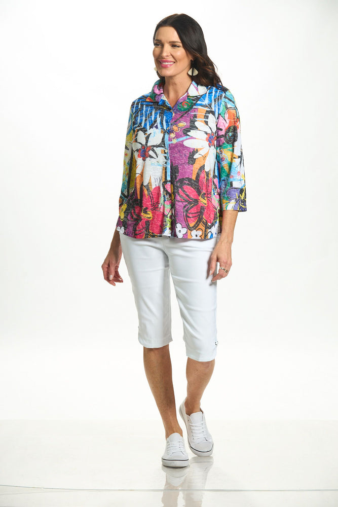 Front image of Fashion Cage roll sleeve button front top. Blue floral multi print top. 