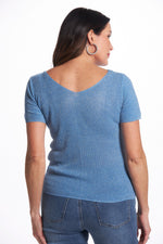 Back image of look mode short sleeve shimmer sweater. Blue shimmer top. 