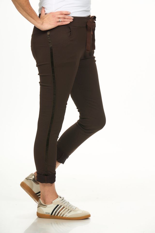 Side image of brown joggers made in italy.