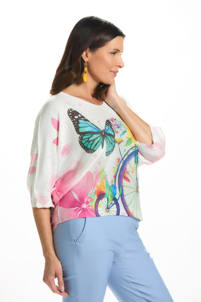Side image of made in italy bike and butterfly sweater. 