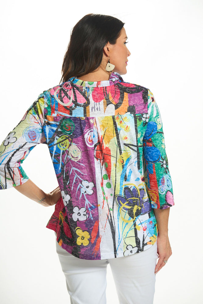 Back image of Fashion Cage roll sleeve button front top. Blue floral multi print top. 