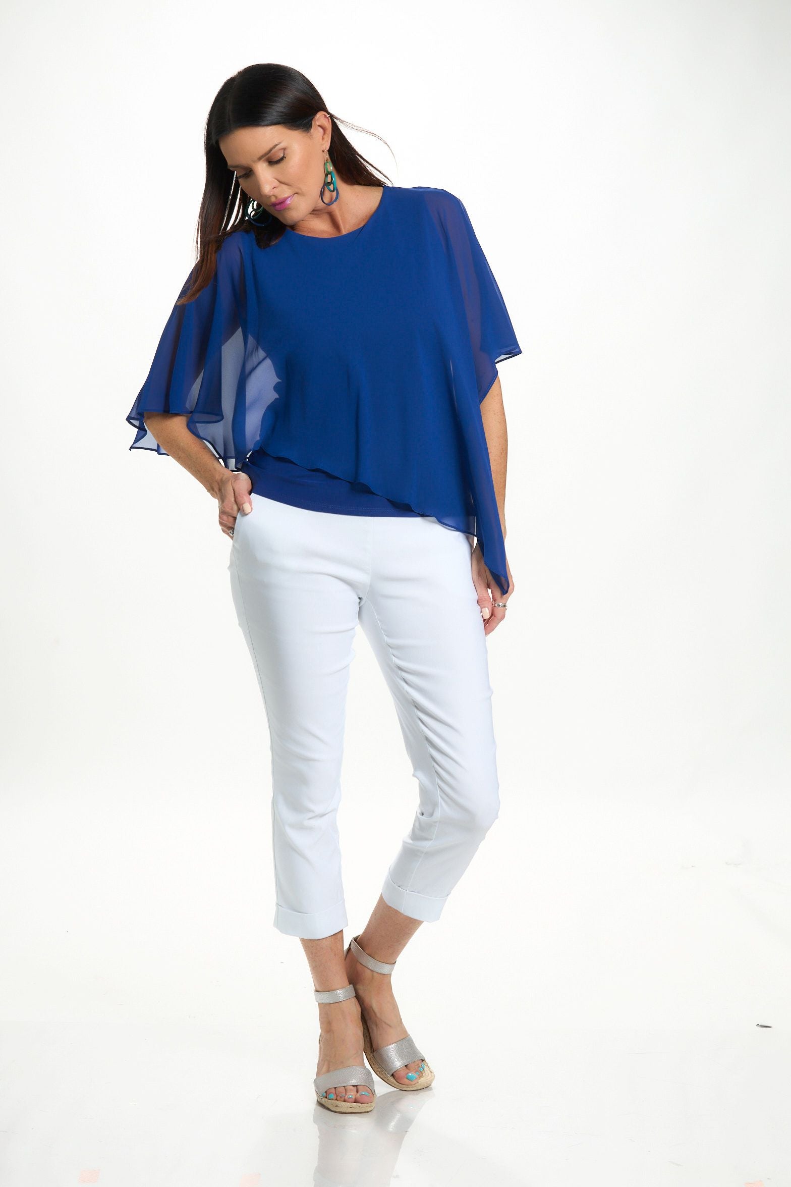 Front image of last tango chiffon top in royal blue. 