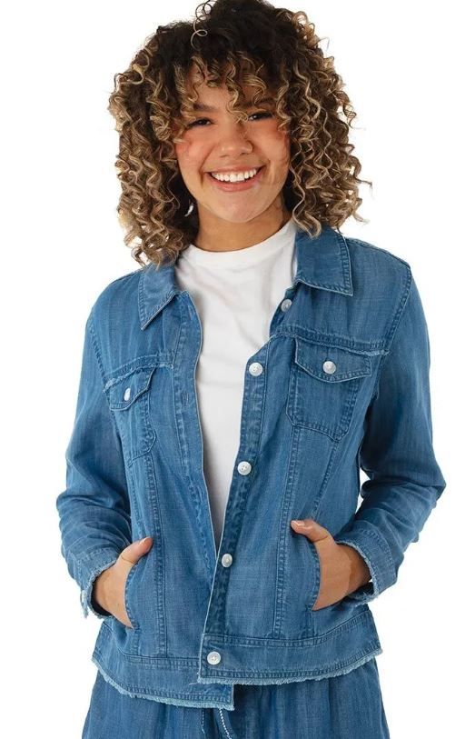 Front image of Coolibar long sleeve chambray cropped jacket. Light indigo button front jacket. 