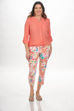 Front image of Elo button and tie front blouse in coral. 