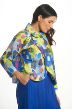 Side image of Shana short printed crushed jacket. Bright blue printed cowl neck jacket. 