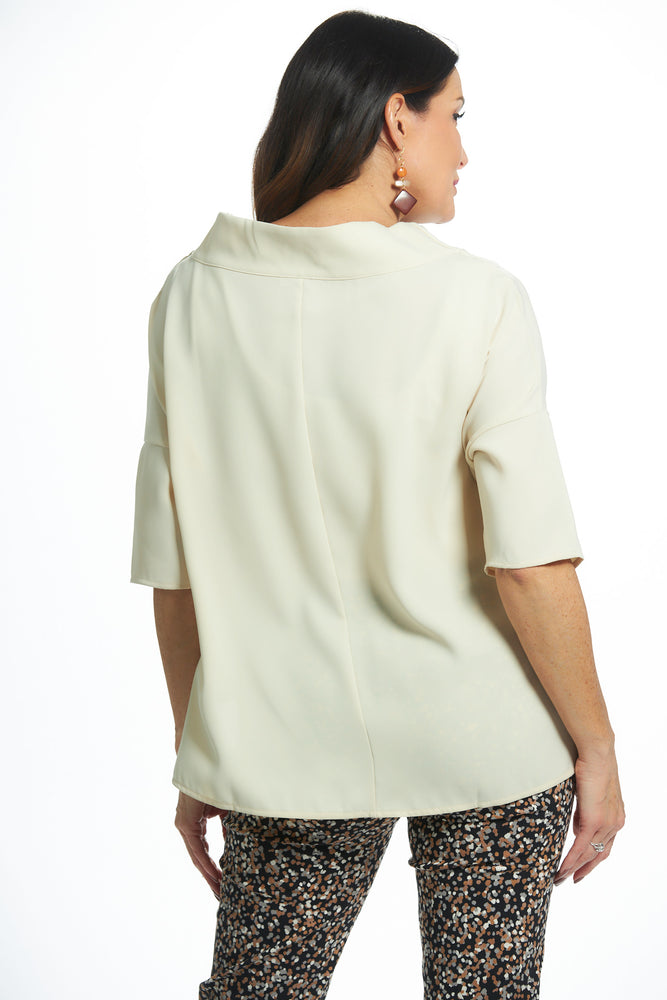 Back image of suzy d london cream cowl neck top. 