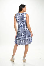 Back image of Shana sleeveless crinkle layer dress in navy print. 