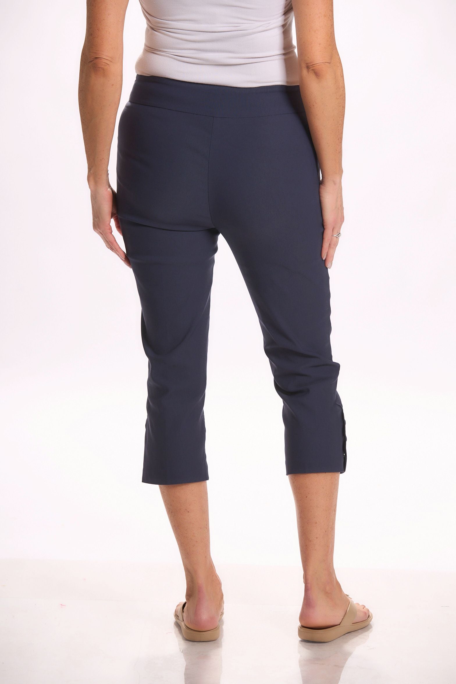 Back image of Tribal side snap capri in deep blue. 