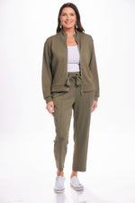Front image of pintuck waist tie pants in dusty olive. Pull on athleisure pants. 